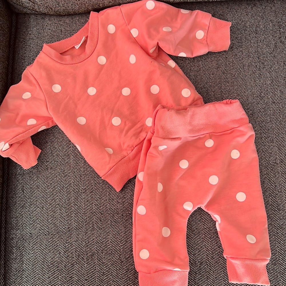 Fashion Network Pink and White Polkadot Sweat suit.